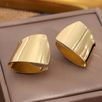 Brincos de metal assimétricos