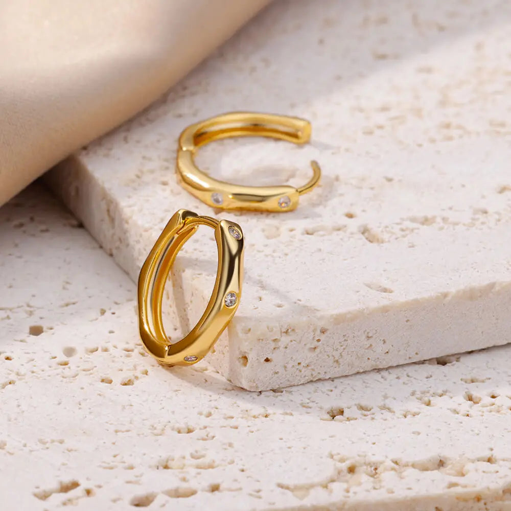 Brincos argola dourado