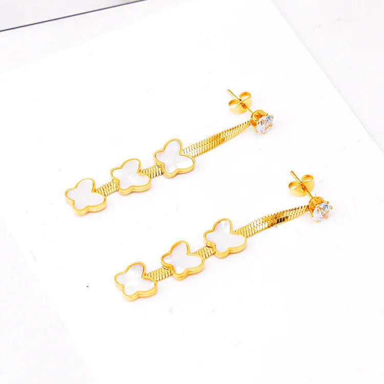 Brincos com zirconia e borboletas