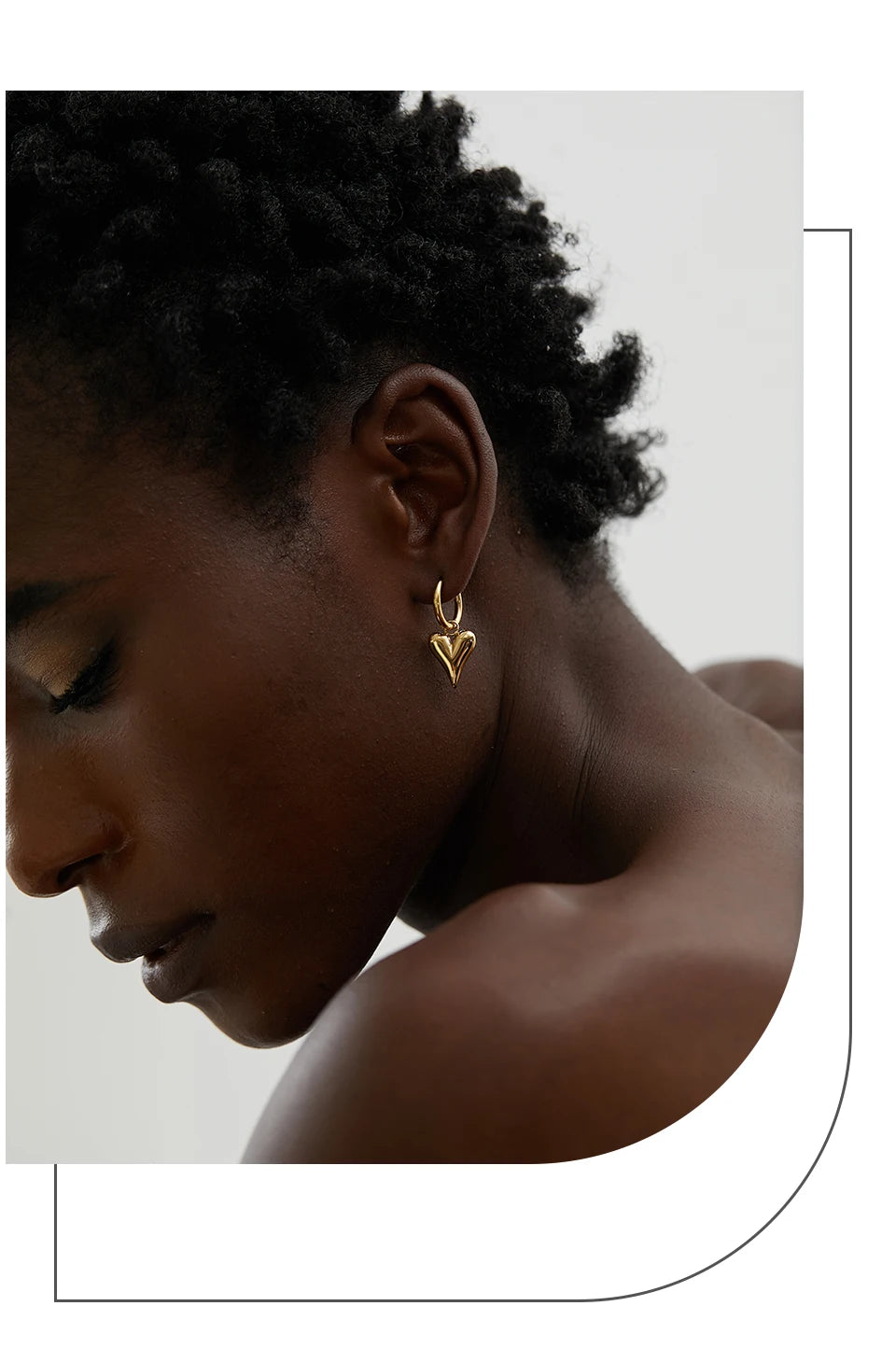 Brinco coracao dourado