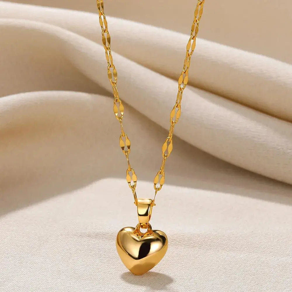 Colar de coracao dourado