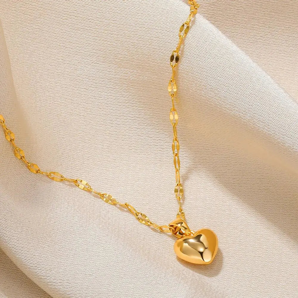 Colar de coracao dourado